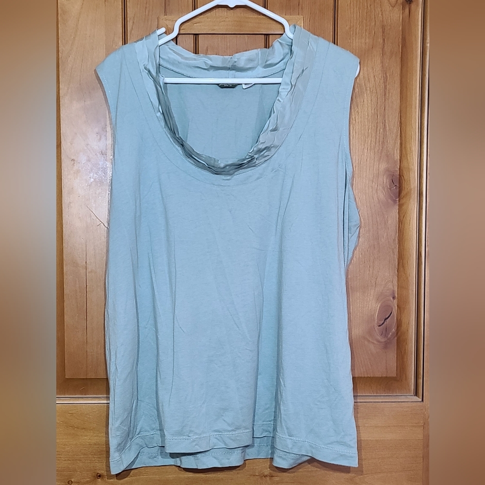Light blueish Eddie Bauer tank with ribbon design on neck. Very pretty size 2xl